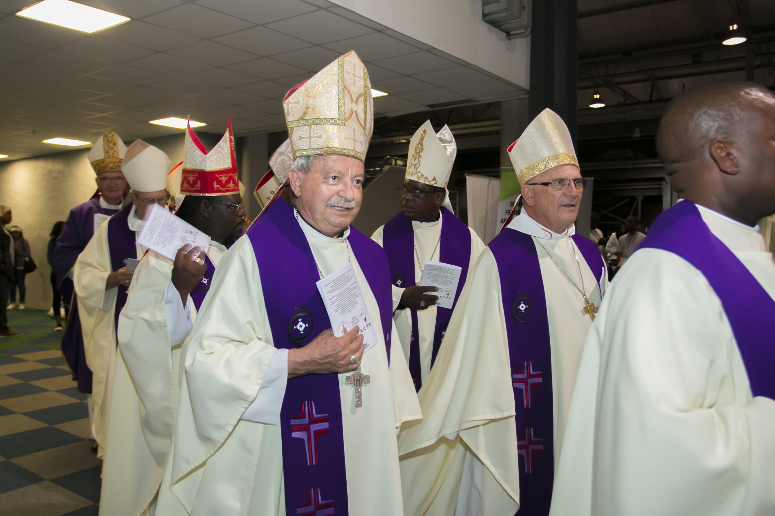 Bishop Joe Sandri MCCJ on the left Bishop Joe Sandri MCCJ on the left